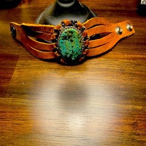 Beautiful LeatherRock bracelet. Snap closure . Very soft leather.